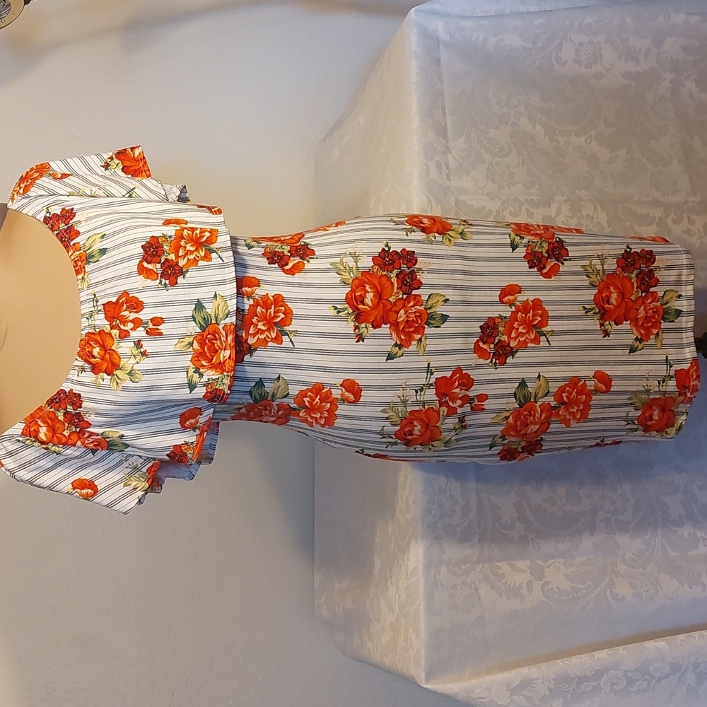 MELI & EVE  floral dress. Size XS. Pre-owned like new.